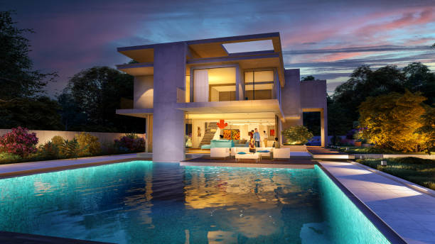 istock Impressive modern  mansion with pool at dusk 1390453632