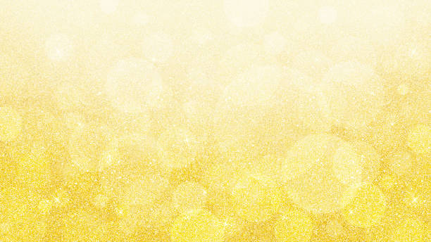 istock Yellow Gold colors bokeh abstract background with bubbles. Glittery glowing luxury texture pattern. 1390453670