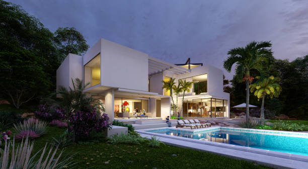 istock Luxury modern  villa with pool at dusk 1390453920