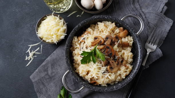 istock Mushroom risotto garnished with parsley  and parmesan. 1390454100