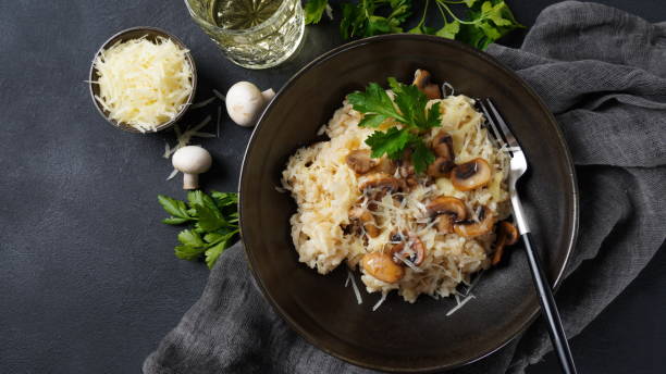 istock Mushroom risotto garnished with parsley  and parmesan. 1390454137