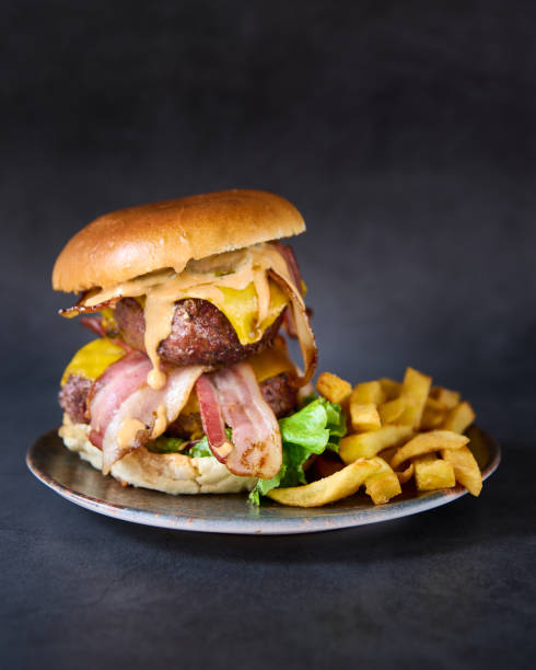 istock hamburger with french fries on chalkboard background 1390457589