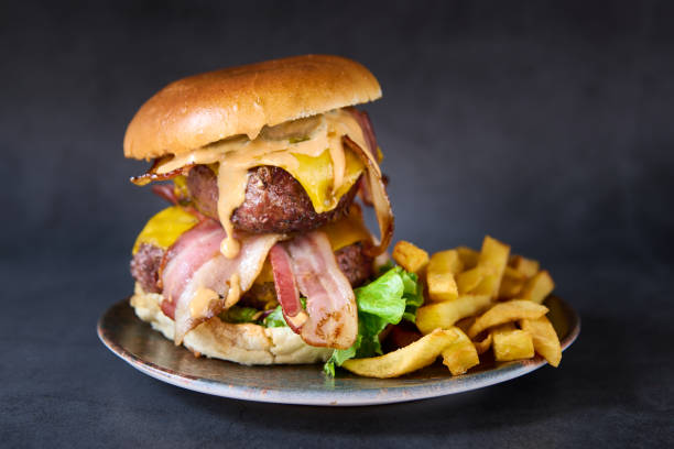 istock hamburger with french fries on chalkboard background 1390457591