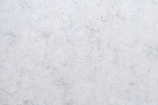 Modern grey paint limestone texture background in white light seam home wall paper.