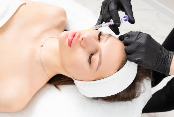 istock Lip contouring treatment. Lip augmentation with hyaluronic acid. 1390458638