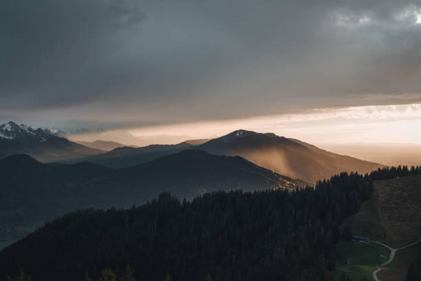 istock A dreamlike light atmosphere in the mountains on a rainy day at sunset. 1390464229