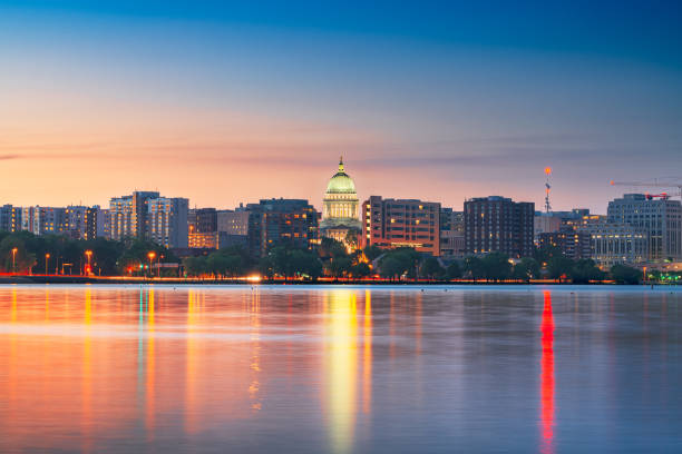 Madison, Wisconsin, USA Downtown Skyline on Lake Monona Madison, Wisconsin, USA downtown skyline at dusk on Lake Monona. lake monona photos stock pictures, royalty-free photos & images