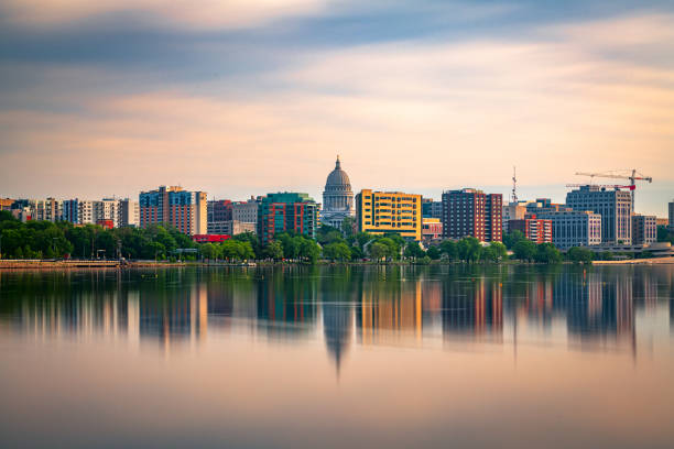 Madison, Wisconsin, USA Downtown Skyline on Lake Monona Madison, Wisconsin, USA downtown skyline at dusk on Lake Monona. lake monona photos stock pictures, royalty-free photos & images