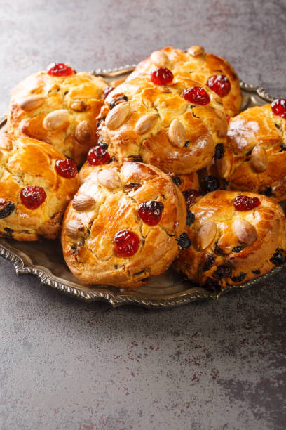istock Yorkshire Fat Rascal are a cross between a rock cake and a scone closeup in the plate. Vertical 1390472278