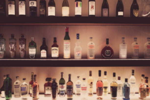 istock Bottle of liquor placed on a bar counter 1390479584