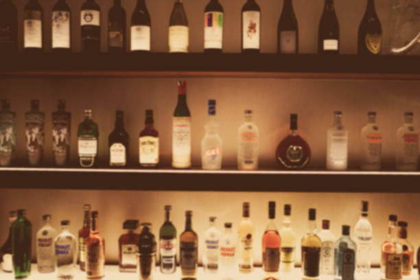 istock Bottle of liquor placed on a bar counter 1390479590
