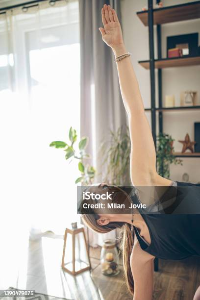 Woman Is Stretching Her Long Legs On The Fitness And Circuit Training Stock  Photo - Download Image Now - iStock