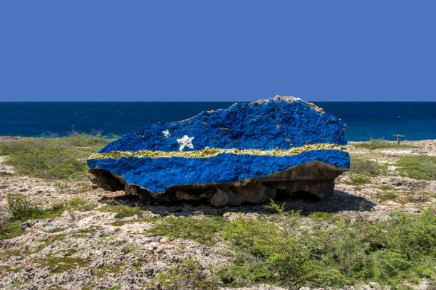 Flag of Curacao, painted on a rock.