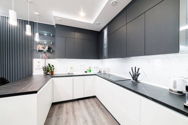 istock Stylish designer kitchen in black and white 1390482180
