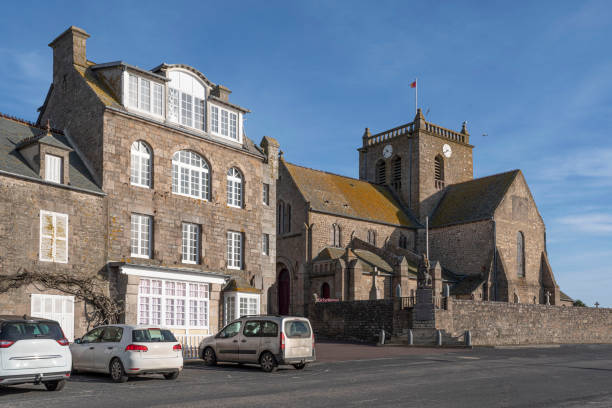 istock House and church in Normandy 1390486551