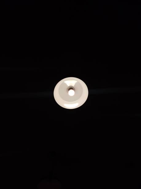 istock White lamp in the dark 1390489448