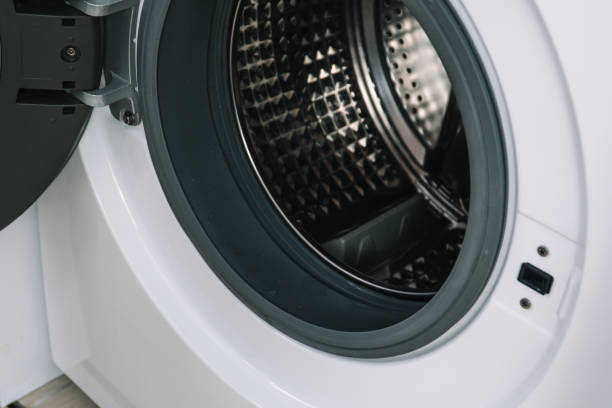 istock Washing dryer machine inside view of a drum close up 1390494631