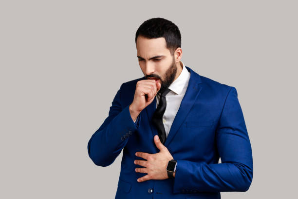 istock Bearded man coughing, catches cold, having high temperature, having influenza symptom. 1390498008