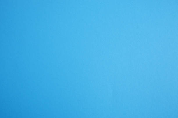 istock Paper, cardboard background. High resolution paper texture. Colored Blue background. 1390503262