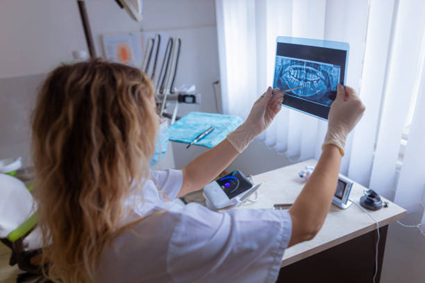 istock Dental student, during private practice learning new things about dental radiology 1390508173