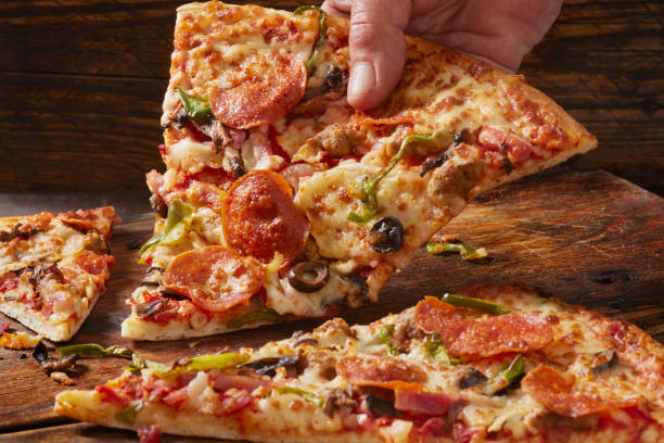 istock Deluxe New York Style Pizza 1390517892