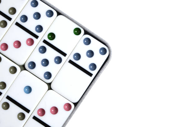 istock Dominoes with colorful coloring white background in package. 1390527055