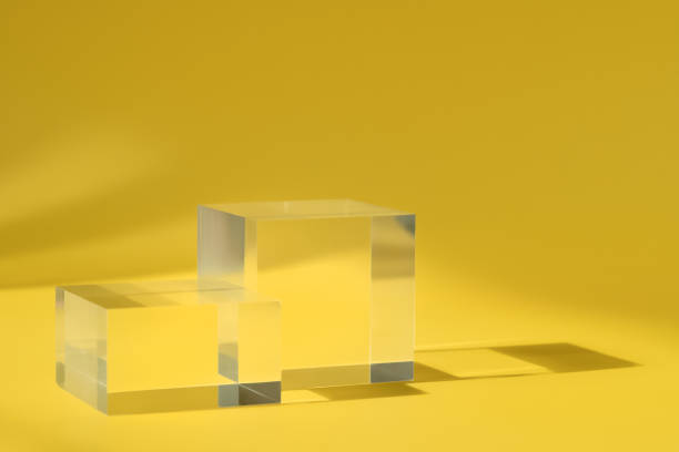 istock Pedestal display glass cube, block platform, transparent geometric stand for cosmetics 1390529994