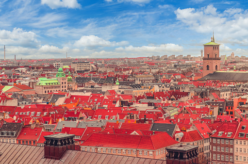 Panoramic view of old houses and red roofs of the city. Copenhagen, Denmark