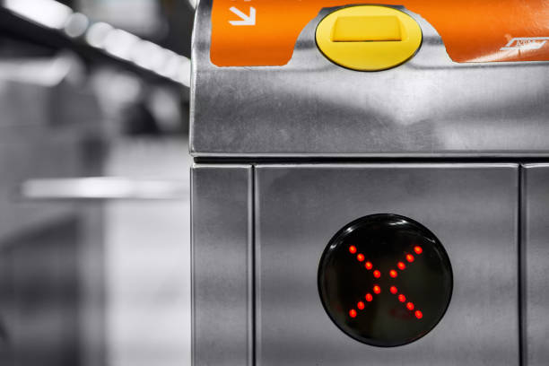 istock Closeup of electronic turnstile at subway station platform. Gates are closed. Automatic access system control, check point. Pass through the passes. 1390536329