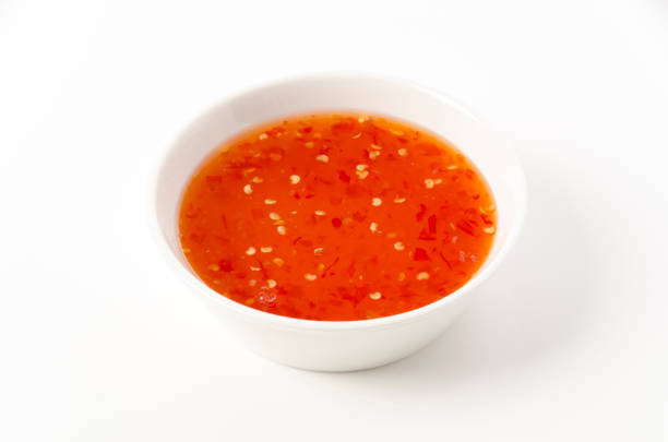 istock Sweet chili sauce on white background. 1390548347
