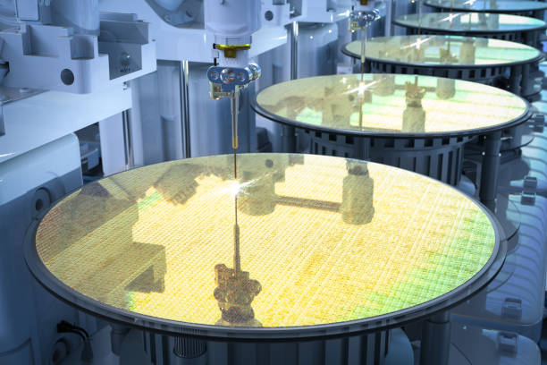 fabricación de semiconductores con brazos robóticos - wafer fotografías e imágenes de stock