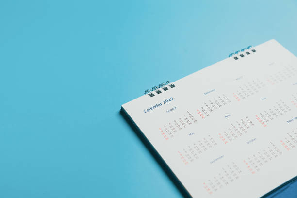 istock Close top view on white calendar 2022 month schedule Work planning and life concept. 1390554156