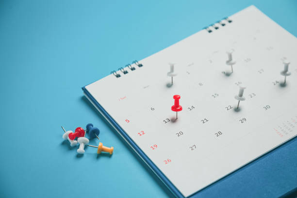 istock Close top view on white calendar 2022 month schedule Work planning and life concept. 1390554172