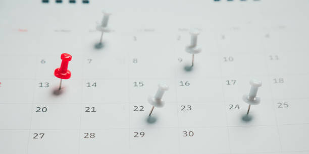 istock Close top view on white calendar 2022 month schedule Work planning and life concept. 1390554177