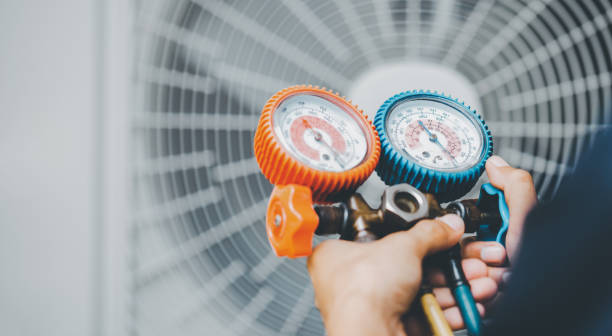 istock Air Conditioning Technician and A part of preparing to install n 1390554375