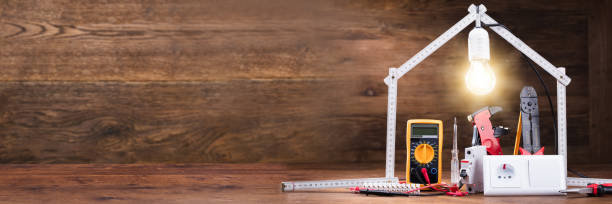 istock Repair Tools Under The Illuminated House 1390560307