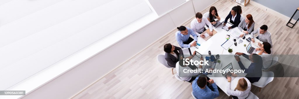 Multi Ethnic Business People Having Business Meeting Group Of Multi Ethnic Business Team Sitting Together At Workplace In Modern Office Meeting Stock Photo