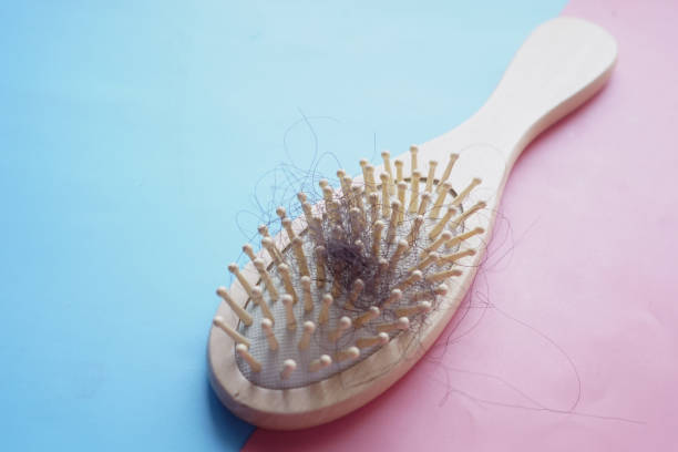 istock a brush with lost hair on table 1390568282