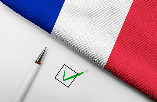 Pencil, Flag of France and check mark on paper sheet