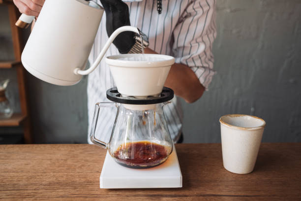 istock barista dripping coffee and slow coffee bar style 1390571645