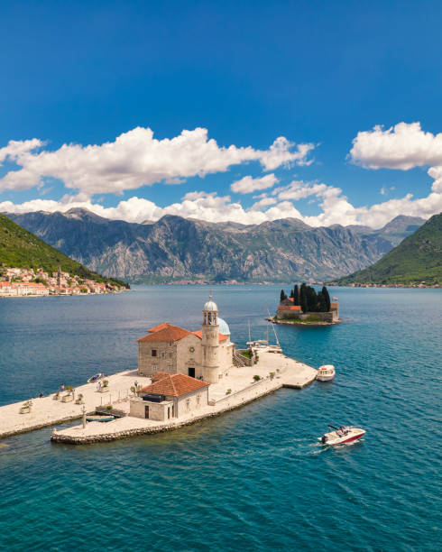 Saint George Island and Church of Our Lady of the Rocks in Perast Saint George Island and Church of Our Lady of the Rocks in Perast; Montenegro kotor montenegro stock pictures, royalty-free photos & images