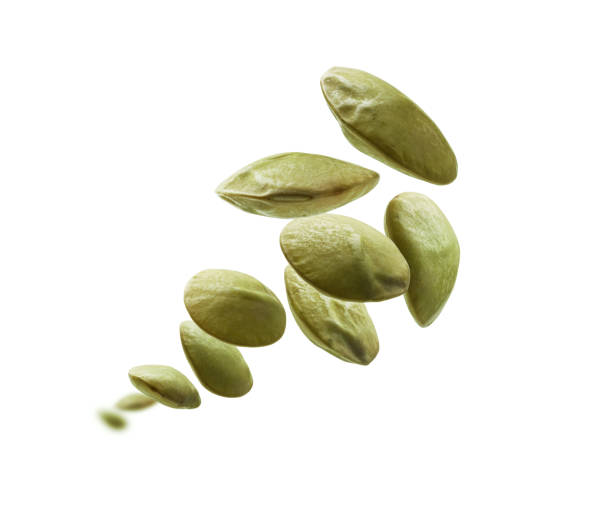 istock Green lentils levitate on a white background 1390585558