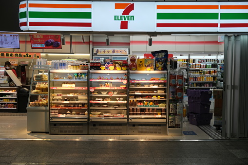 Shanghai,China-Jan.8th 2022: facade of 7-Eleven convenience store and brand logo. Chain of retail convenience store