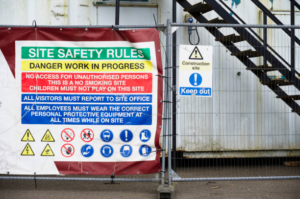 istock Construction site health and safety message rules sign board signage on fence boundary 1390593220