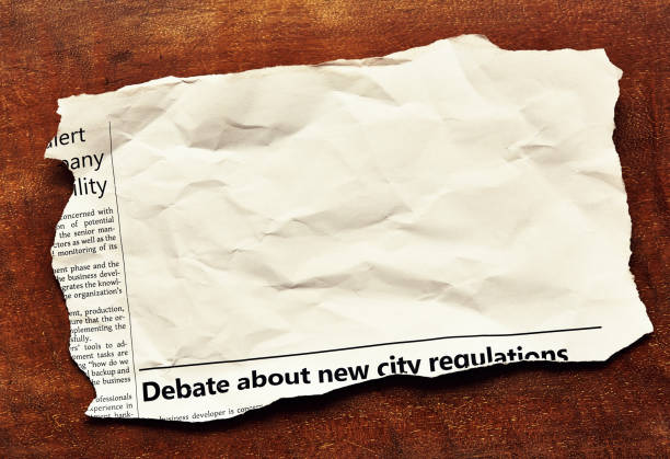 istock Crumpled cutting from a newspaper, with plenty of space for your copy 1390593399