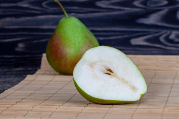 istock pear cut into pieces and slices during cooking 1390594683