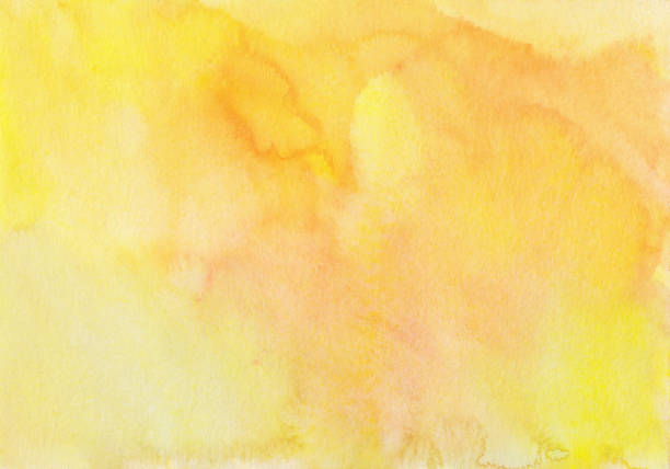istock Watercolor bright yellow background texture. Watercolour backdrop. Stains on paper, hand painted. 1390597577