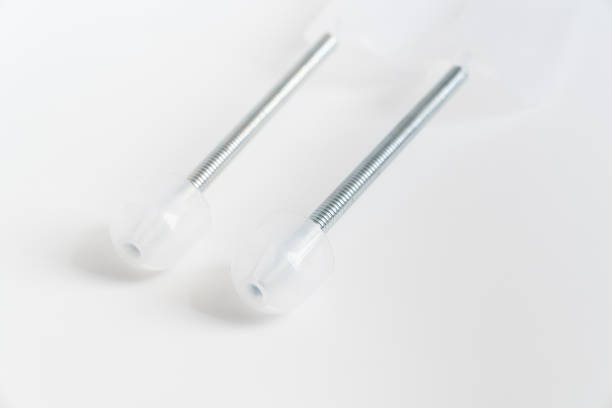 istock Flexible plastic spring mold holders for shoes on a white background. 1390598299