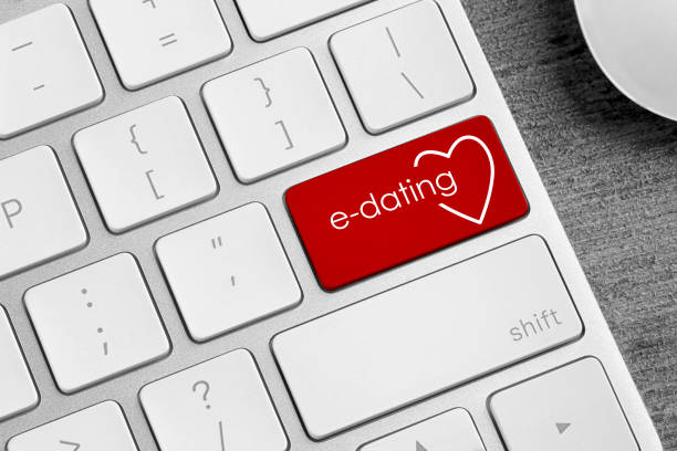 istock Love button on laptop keyboard, closeup. Online dating site 1390606253