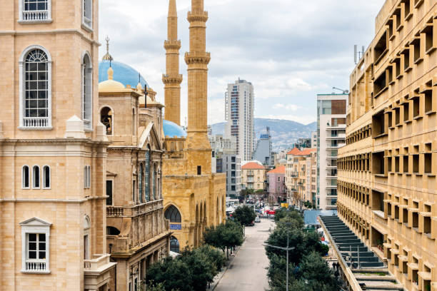 Street in Beirut Central District with St. Georges Maronite cathedral and Al-Amin mosque, Beirut, Lebanon Architecture of Beirut Central District with St. Georges Maronite cathedral and Al-Amin mosque, Beirut, Lebanon lebanon beirut stock pictures, royalty-free photos & images